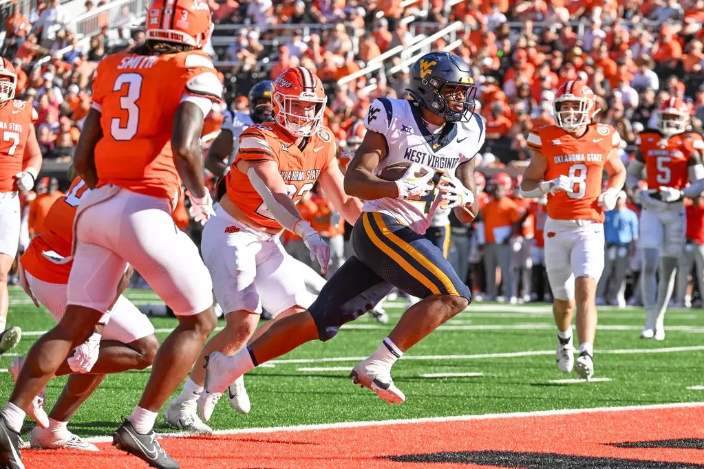 Jahiem White's 158 yards power WVU past reeling Oklahoma State